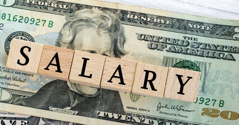 A $20 bill with the word SALARY on top