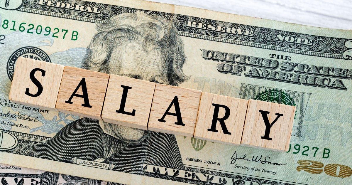 A $20 bill with the word SALARY on top